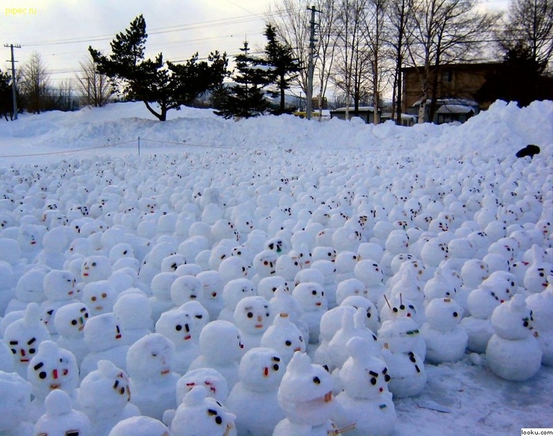 Snowmen having climate warming protest